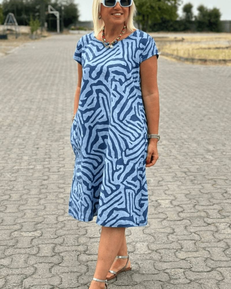 Nora | Mujer Vestido de Verano con Estampado de Cebra y Bolsillos