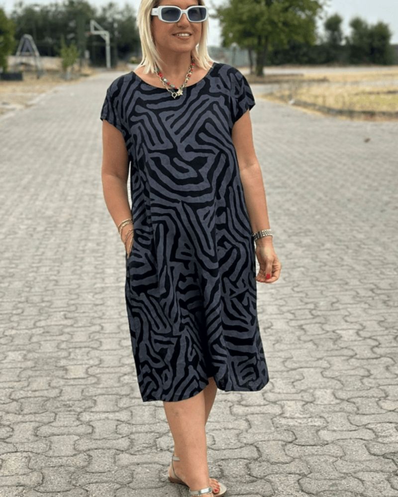 Nora | Mujer Vestido de Verano con Estampado de Cebra y Bolsillos