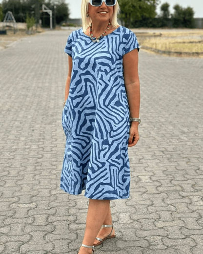 Nora | Mujer Vestido de Verano con Estampado de Cebra y Bolsillos