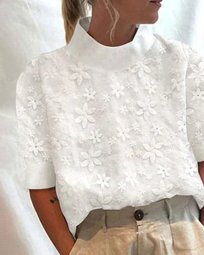 Juna | Mujer Blusa de Cuello Alto con Bordado Floral