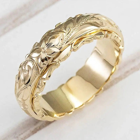 Anillo Flor de Acero Inoxidable Tono Dorado con Motivo Floral